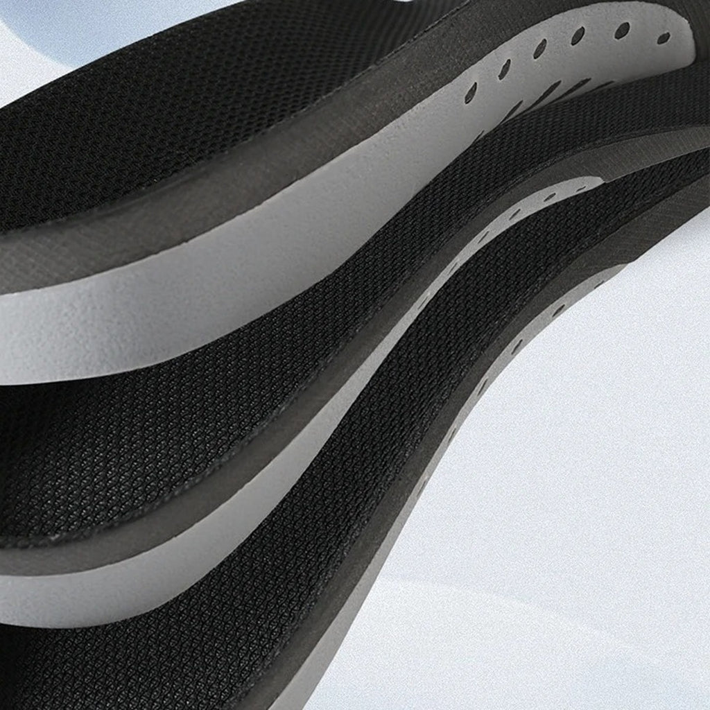 Side view of stacked Archkind insoles showing the deep heel cup