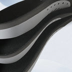 Side view of stacked Archkind insoles showing the deep heel cup